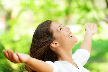 woman enjoying clean air outdoors