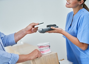 Patient using credit card to pay for treatment