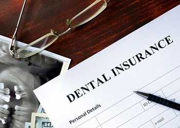 Dental insurance paperwork for the cost of dental implants in Cumberland