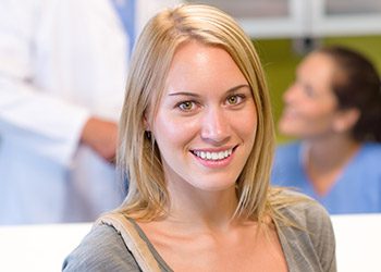 Smiling woman in dental chair