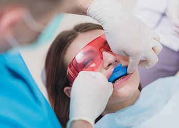 Child receiving fluoride treatment