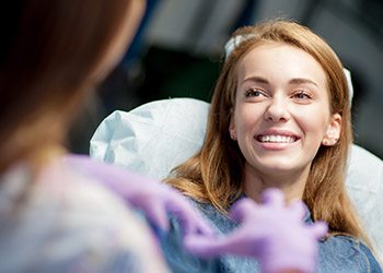 Smiling woman in dental chair