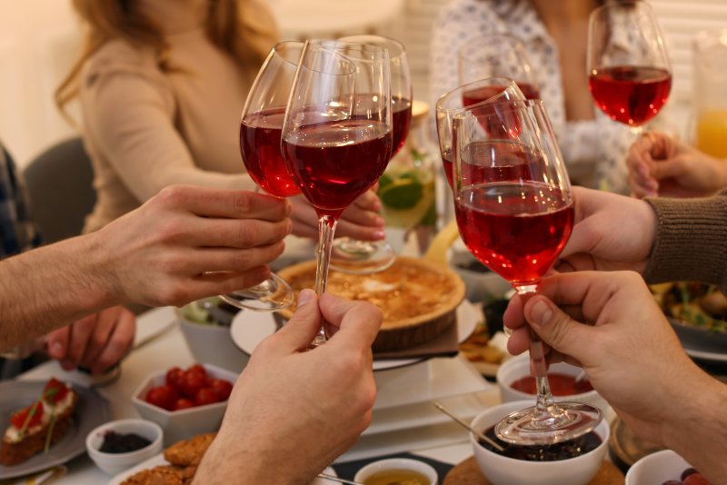 Woman drinking a glass of red wine