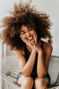 Woman with a beautiful smile laughing