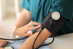 Patient having their blood pressure checked